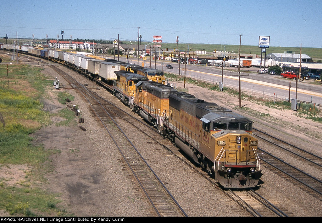 UP 6254 East passing A tower 